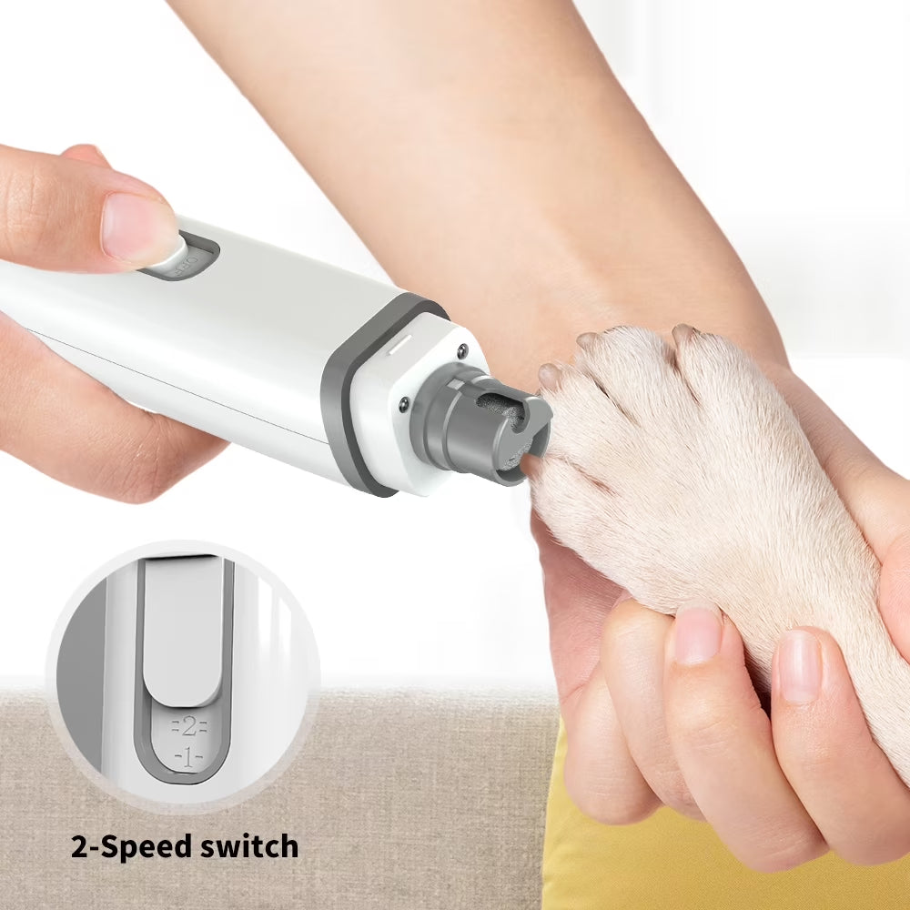 FurNinja PawPro nail grinder being used on a dog paw with two speed settings